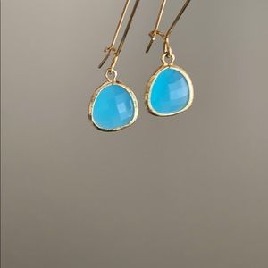 Gold and blue earrings